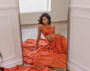 Embroidered Lehenga Choli: Orange Party Wear with Mirror Work