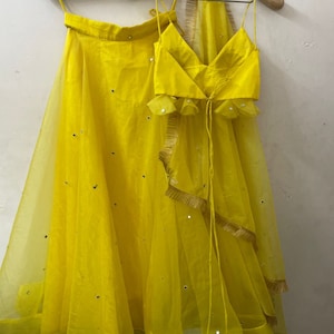 Yellow Spaghetti Strap Lehenga Choli: Indian Wedding Outfit with Mirror Work