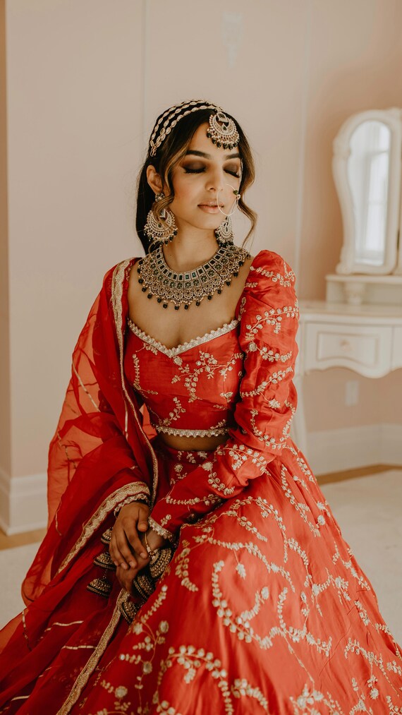 Party wear red lehenga store