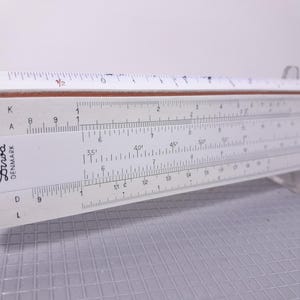 Regolo calcolatore vintage Diwa rietz 301, con custodia originale in pelle