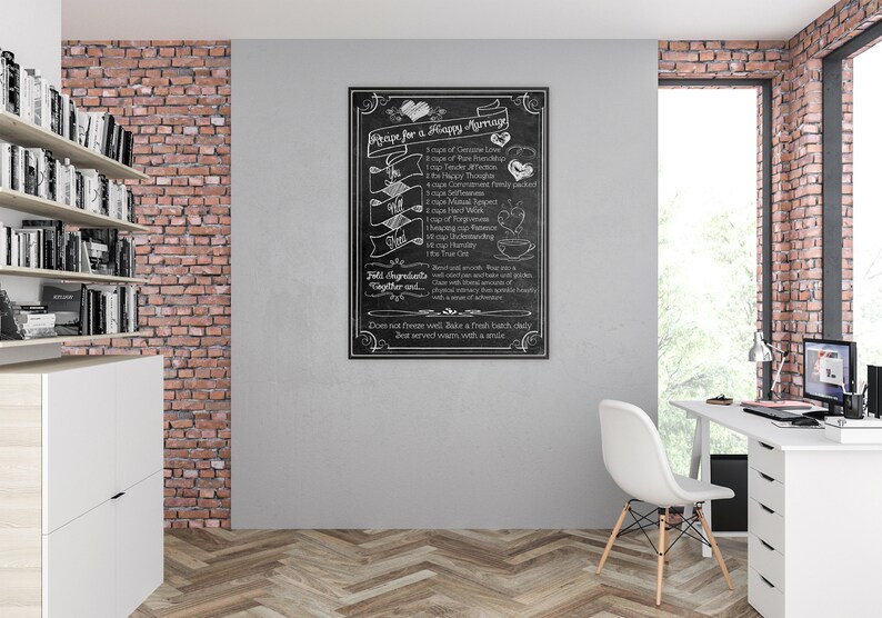 May include: A black and white chalkboard sign with a recipe for a happy marriage. The recipe includes ingredients like genuine love, true friendship, happy thoughts, mutual respect, and understanding. The sign is framed in a black frame and hangs on a brick wall.