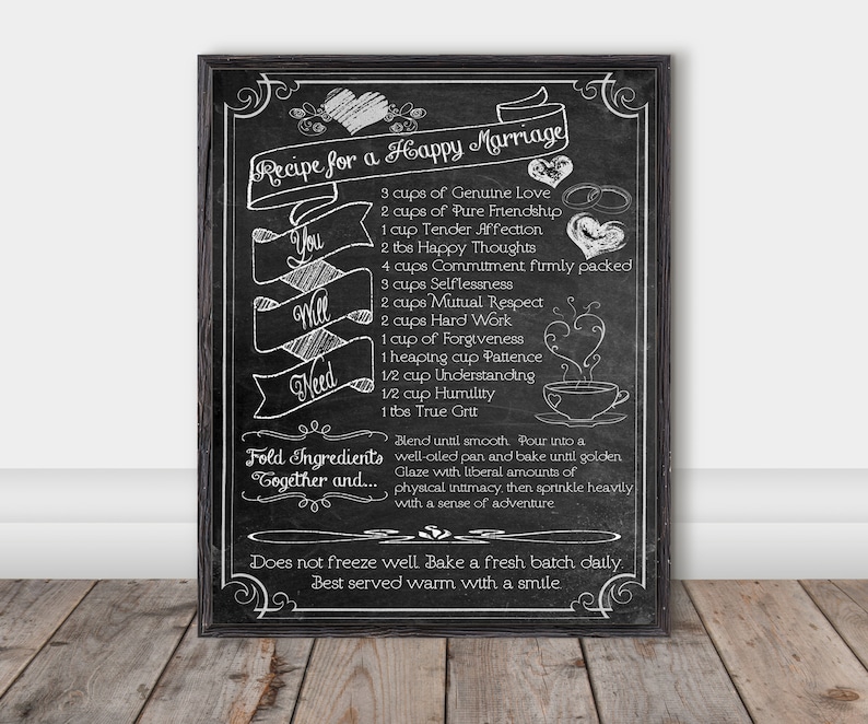 May include: Blackboard with a white chalk drawing of a recipe for a happy marriage. The recipe lists ingredients such as genuine love, pure friendship, tender affection, happy thoughts, commitment, selflessness, mutual respect, hard work, forgiveness, patience, understanding, humility, and true grit. The text reads "Recipe for a Happy Marriage" and "Fold Ingredients Together and..."