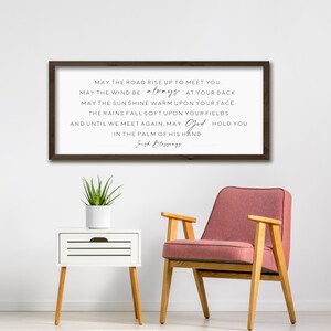 May include: A framed print with a white background and black text. The text reads: "May the road rise up to meet you. May the wind be always at your back. May the sun shine warm upon your face: The rains fall soft upon your fields and until we meet again. May God hold you in the palm of his hand. Irish Blessings."