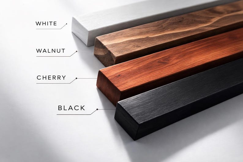May include: Four wooden bars in white, walnut, cherry, and black, with text labels. The bars have beveled edges. The walnut and cherry bars show the wood grain. Measurements are not included.