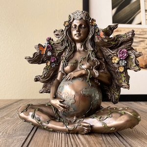 Sitting Pregnant Mother Gaia With Butterflies