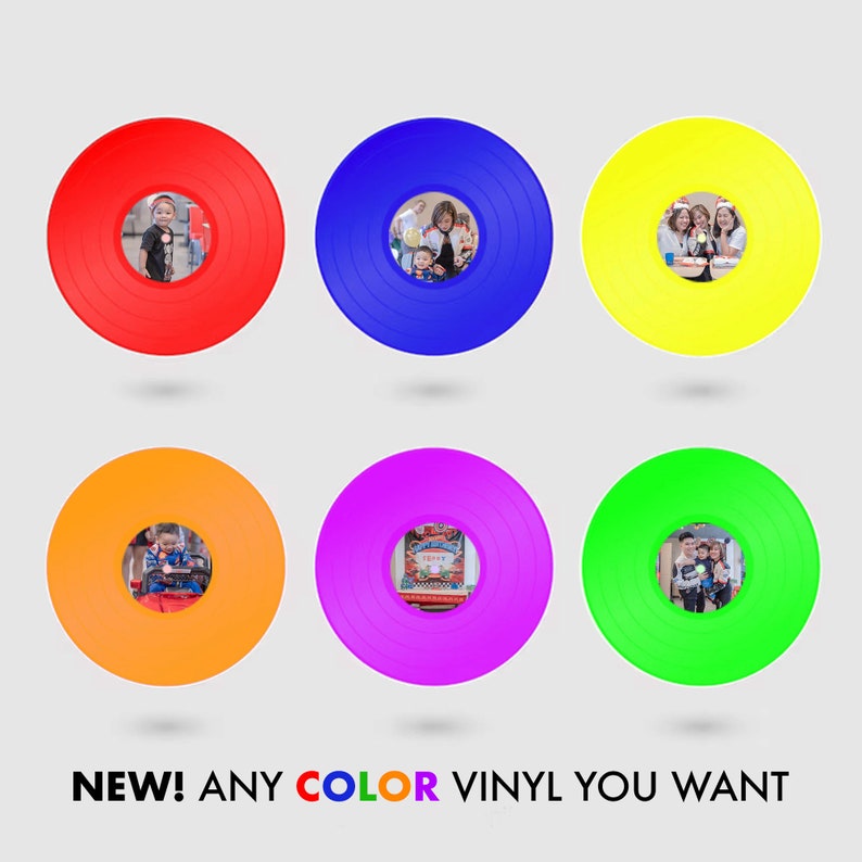 May include: Six vinyl records in different colors, including red, blue, yellow, orange, purple, and green. Each record has a photo of a family in the center.
