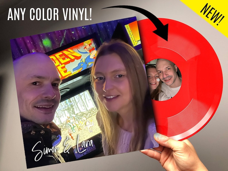 May include: A red vinyl record with a photo of a couple in front of a vintage arcade game. The text "Simon & Lara" is written on the record.