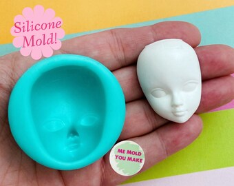 Silicone mold of a doll face