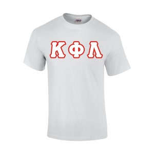 May include: White t-shirt with the Greek letters KΦΛ in red, outlined in white. The shirt is made of a soft material and has a crew neck. The Gildan logo is visible on the tag.