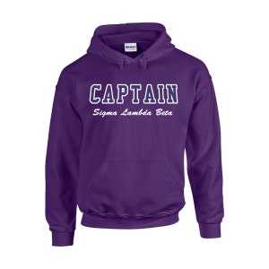 May include: Purple hooded sweatshirt with the text "CAPTAIN Sigma Lambda Beta" in white and blue lettering.