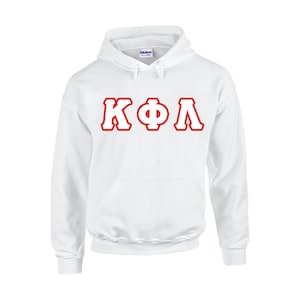 May include: White hooded sweatshirt with a kangaroo pocket and red Greek letters. The letters are outlined in red. The sweatshirt is made of a soft material and has a drawstring hood.