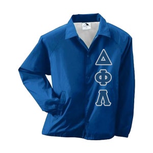 May include: A royal blue jacket with a white interior and a button-up front. The jacket features a collar and two front pockets. White Greek letters are displayed on the front.