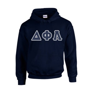 May include: Navy blue hooded sweatshirt with the Greek letters Delta, Phi, and Lambda in white with a light blue outline. The sweatshirt has a front pocket and a hood.