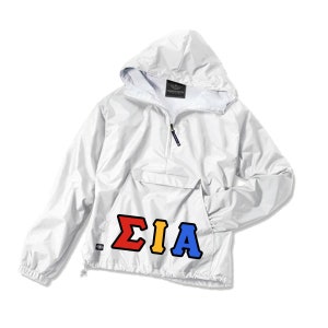 May include: White hooded anorak jacket with a front pocket and a half-zip closure. The jacket features the letters ΣΙΑ in red, yellow, and blue. The jacket has a small logo on the left side.