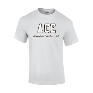 May include: White t-shirt with the word "ACE" in a brown, outlined font, and the text "Lambda Theta Phi" below it. The shirt is a Gildan brand, short-sleeved, and made of a soft material.