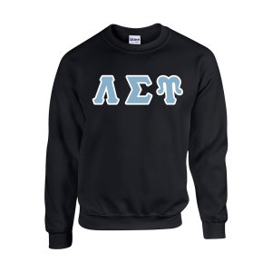 May include: Black crewneck sweatshirt with light blue Greek letters outlined in white. The letters appear to be "&Lambda;&Sigma;&Gamma;". The sweatshirt is made of a soft material and has a classic, casual style.