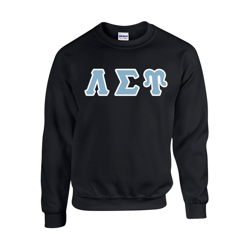 May include: Black crewneck sweatshirt with light blue Greek letters outlined in white. The letters appear to be "&Lambda;&Sigma;&Gamma;". The sweatshirt is made of a soft material and has a classic, casual style.