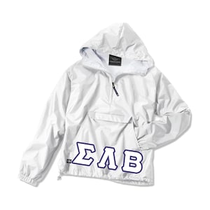 May include: White windbreaker jacket with a navy blue ΣΛΒ Greek letter design on the front.