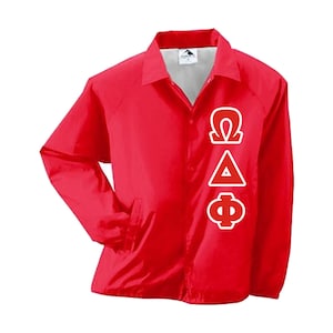 May include: Red nylon jacket with a vertical row of three Greek letters: Omega, Delta, and Phi. The letters are white with red outlines.