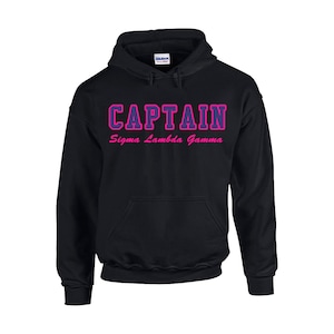 May include: Black hooded sweatshirt with the text "CAPTAIN Sigma Lambda Gamma" in pink and purple lettering.