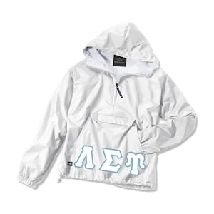 May include: White hooded windbreaker jacket with a light blue Greek letter design that says "ΛΣΠ".