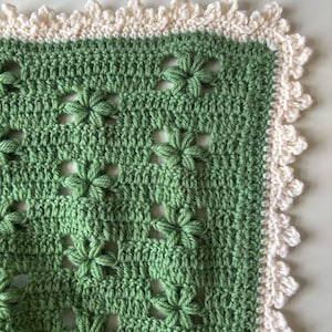crochet throw blanket in sage with a crowned picot border in white