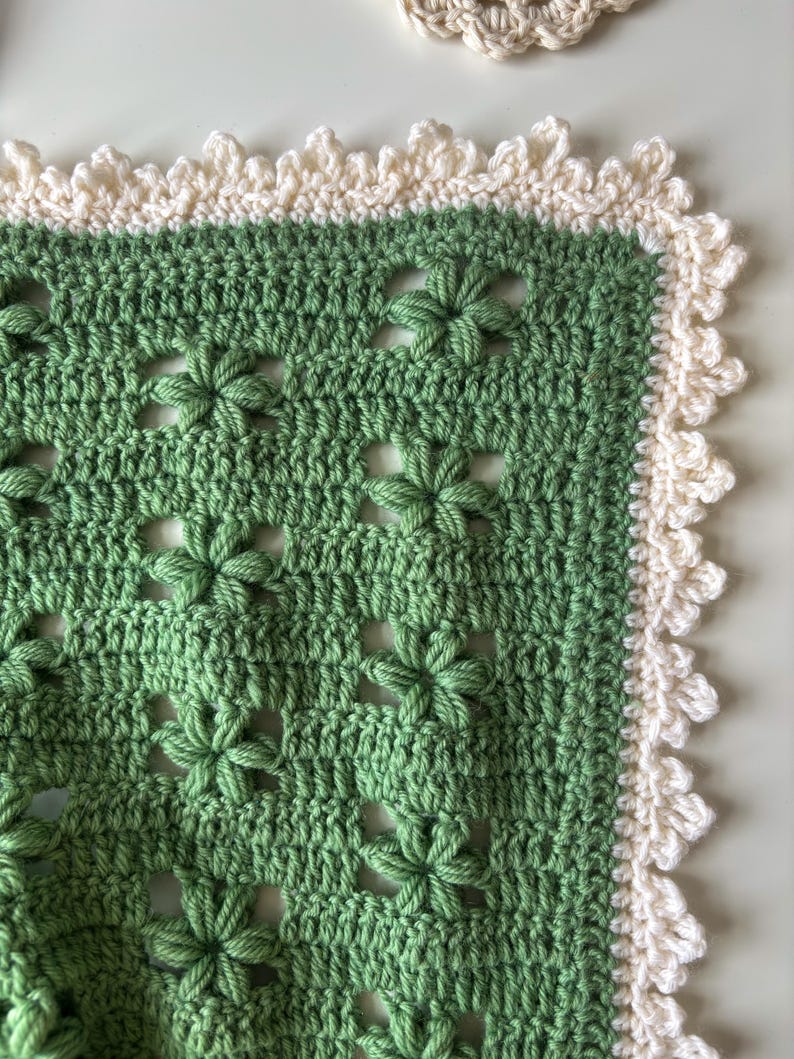 crochet throw blanket in sage with a crowned picot border in white