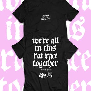May include: Two black t-shirts with white text. The top shirt reads "protect trans runners." The bottom shirt says "we're all in this rat race together" with a quote by Martha P. Johnson and the logos of "WS Queer Run Club" and "The Run Club."