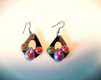 Earrings, wood and sequins.