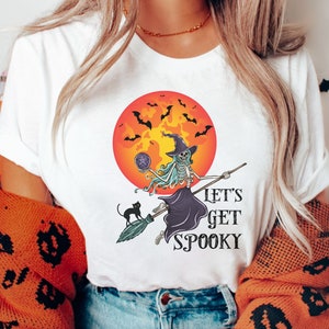 Halloween Tee-shirt, Skeleton Witch On Broomstick Halloween party shirt, Full Moon Witch Top, Spooky Costume gift, unisex fall shirt