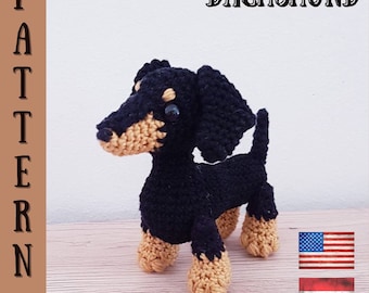 May include: Crochet pattern for a dachshund dog amigurumi. The pattern includes instructions for making a black and tan dachshund with brown eyes. The pattern is available in English and Hungarian.