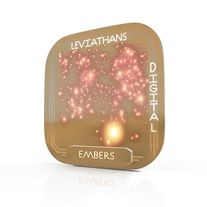 May include: A gold-colored chip with the text "LEVIATHANS DIGITAL EMBERS" on it. The chip has a glowing red and orange pattern.