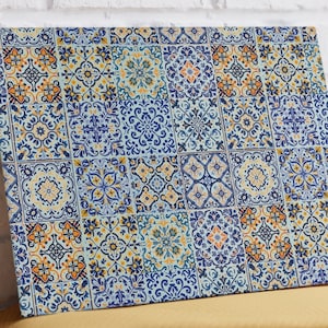 May include: A blue and yellow patterned tile design with intricate floral motifs. The tiles are arranged in a patchwork pattern, creating a vibrant and colorful design.