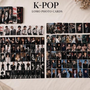 May include: A collection of K-POP Lomo photo cards featuring various male performers. The cards are arranged in rows and columns, showcasing different poses and styles. Some cards are stacked in small boxes. The text "K-POP LOMO PHOTO CARDS" is visible.