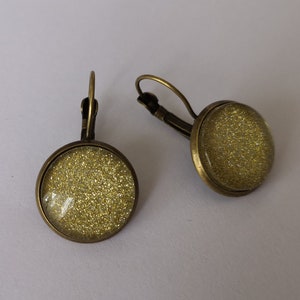 Orecchini sonnodanti in stile bronzo retrò, glitter che sbadigliano oro / oro glitterato