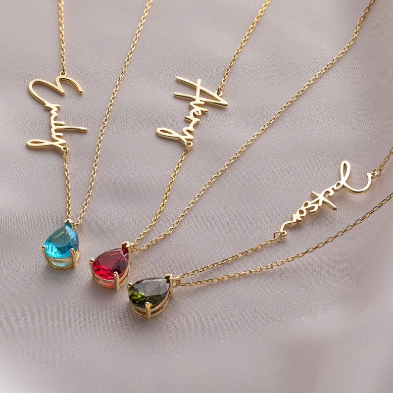 This custom gemstone necklace is the perfect personalized gift for the new mom in your life. Choose from a variety of stone options to represent her birth month, or select multiple colors to represent her children. The options are endless with this