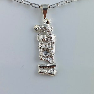 Highly textured Sterling Silver, 925, rectangle or tablet-shaped pendant. Unique pattern on silver is highly detailed & steampunk-like!