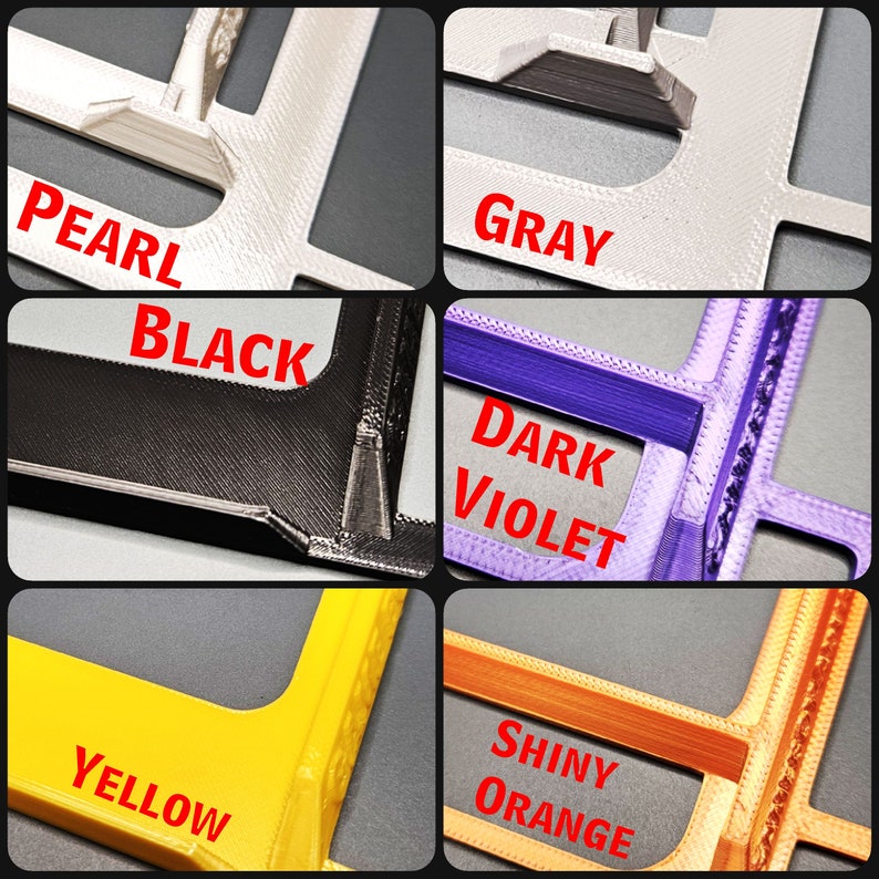 May include: Close-up of five different colored plastic frames. The colors are pearl, gray, black, dark violet, and yellow. The frames are all the same size and shape.