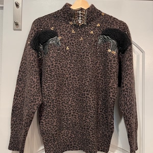 Vintage leopard dolman sleeve demonic hedgehog beaded turtleneck sweater. GUC!
