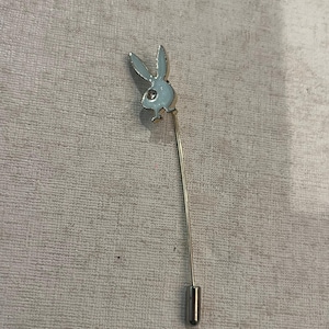 Vintage silver Playboy bunny with rhinestone lapel stick pin. Classic! GUC!