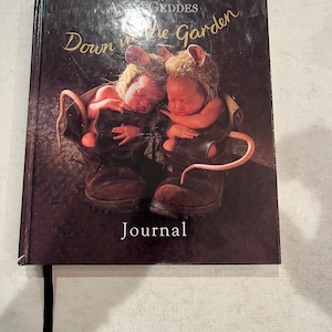 Vintage 90s Anne Geddes ruled journal with classic costumes baby pictures. New