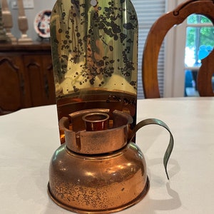 Vintage copper kettle and brass candle wall sconce. GUC!