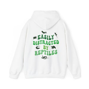 Easily Distracted By Reptiles // Unisex Heavy Blend™ Hooded Sweatshirt