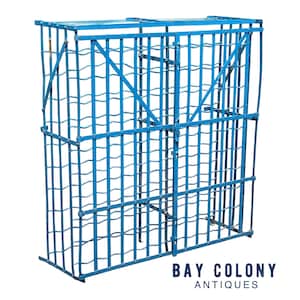 May include: A blue metal wine rack with two doors. The rack is made of a grid pattern and has a simple design. The rack is labeled "BAY COLONY ANTIQUES".