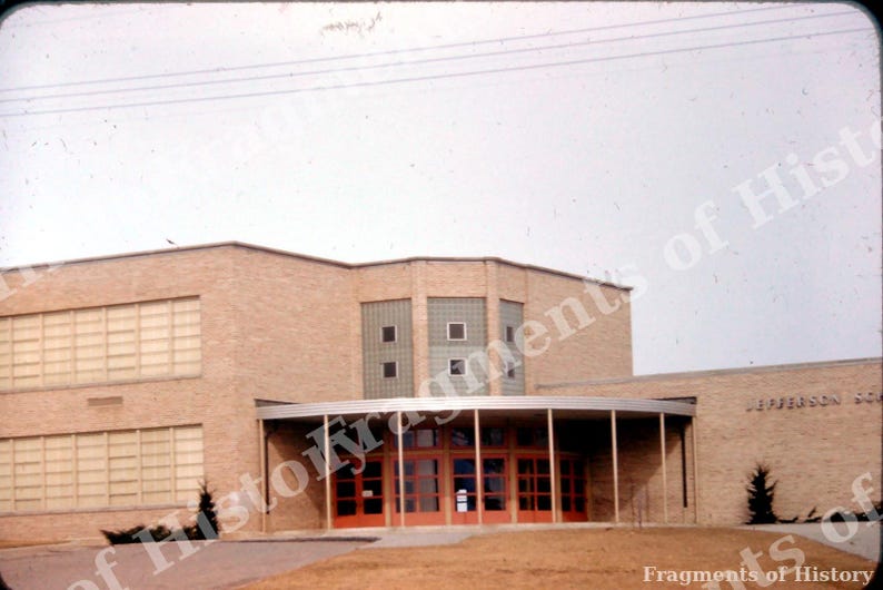 Jefferson School Entrance Close View With Glass Doors and Curved Canopy ...
