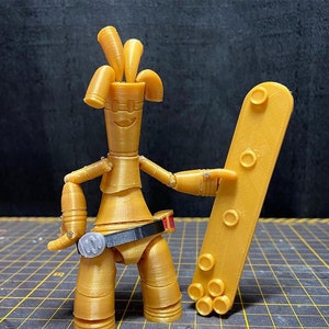 3D-geprinte &quot;Golden Boi&quot; - Actiefiguur