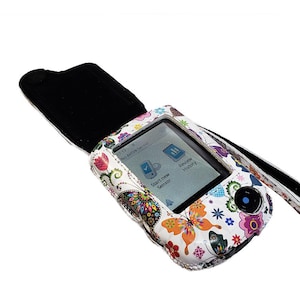 May include: White leather case with a butterfly design for a medical device. The device screen shows the message "No Active Sensor" and has buttons for "Start new Sensor" and "Review History".