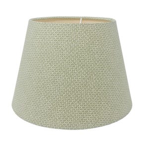 May include: A tapered lampshade with a light green and white geometric pattern. The lampshade has a neutral interior and a simple, elegant design. The shade is suitable for a table lamp or floor lamp.
