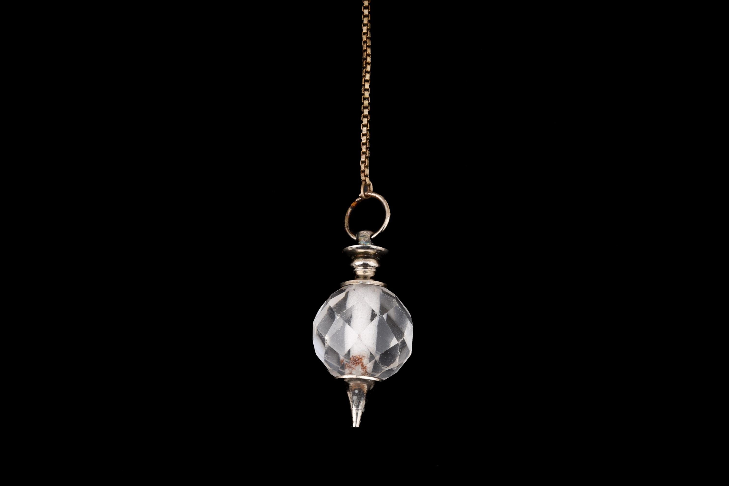 Clear Quartz Faceted Globe Pendulum in Gold-Tone