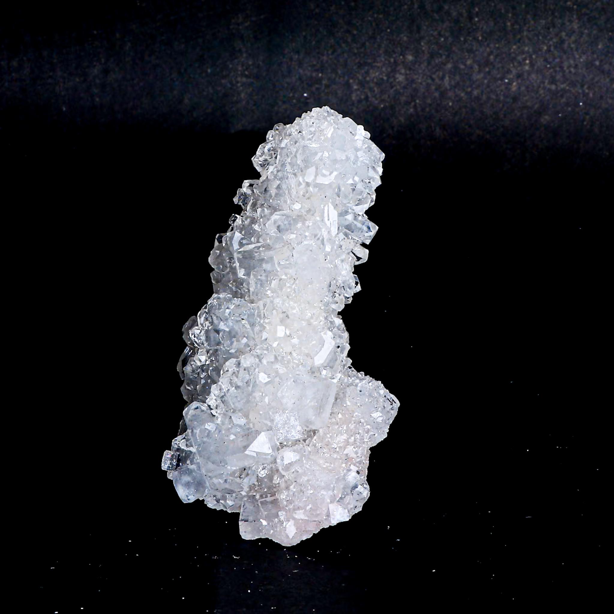 Mirror Apophyllite Stalactite on Chalcedony Matrix: The Frost-Capped Spire